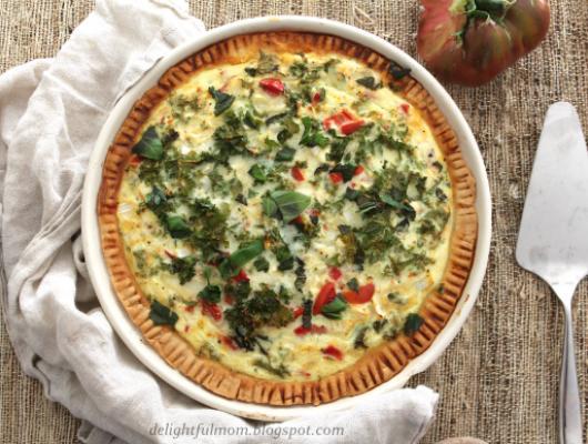 Vegetable Quiche Made With Fresh Tomatoes, Spinach, Basil and Goat Cheese