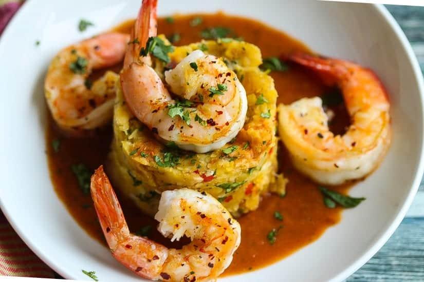 Mofongo Relleno (mashed plantains with shrimp and red pepper sauce)